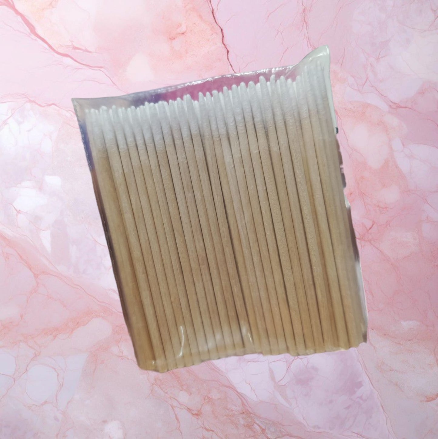 Palillo de madera con punta de algodón