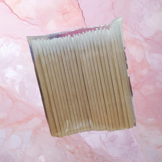 Palillo de madera con punta de algodón